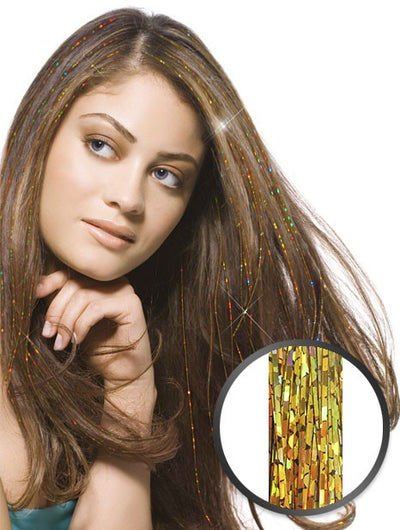 Hair Dazzle hebras de brillo doradas en melena castaña larga, con detalle ampliado de la hebra
